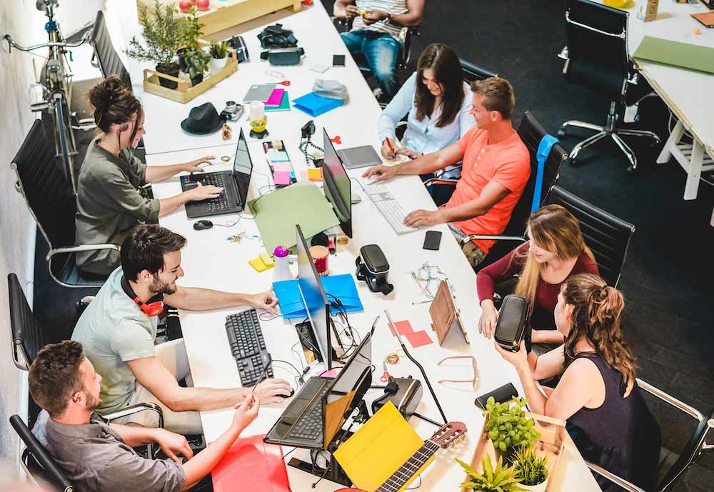 Young co-workers team talking during startup